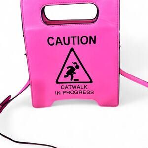 Hot pink caution catwalk in